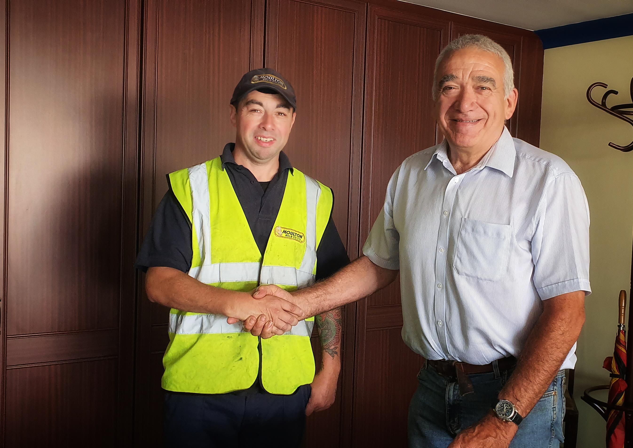 Dez Croft congratulated by Robert Oldershaw for his long service award