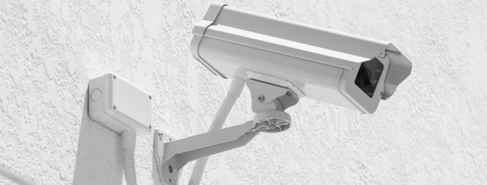 A photo of a CCTV camera on a wall