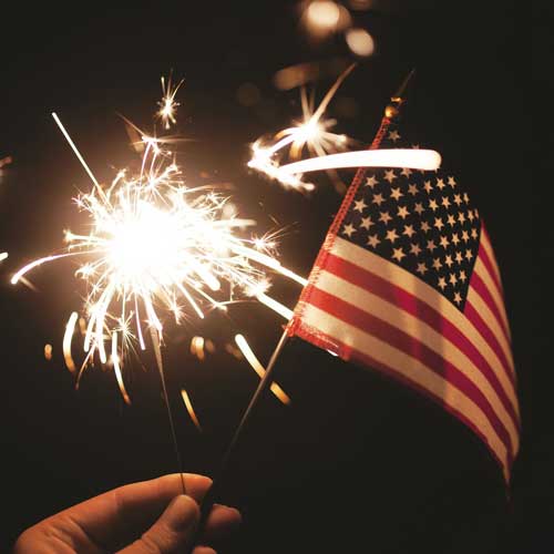 american flag and sparkler