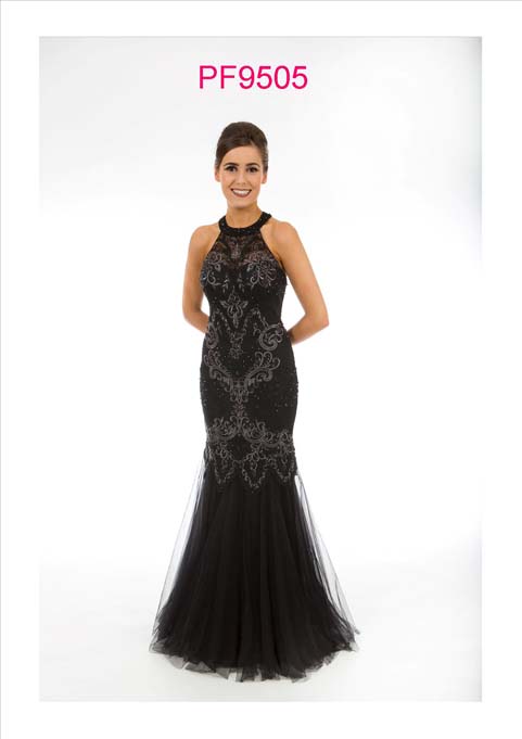 Prom girl wearing a black and silver fishtail gown with racer neck and key hole back detail