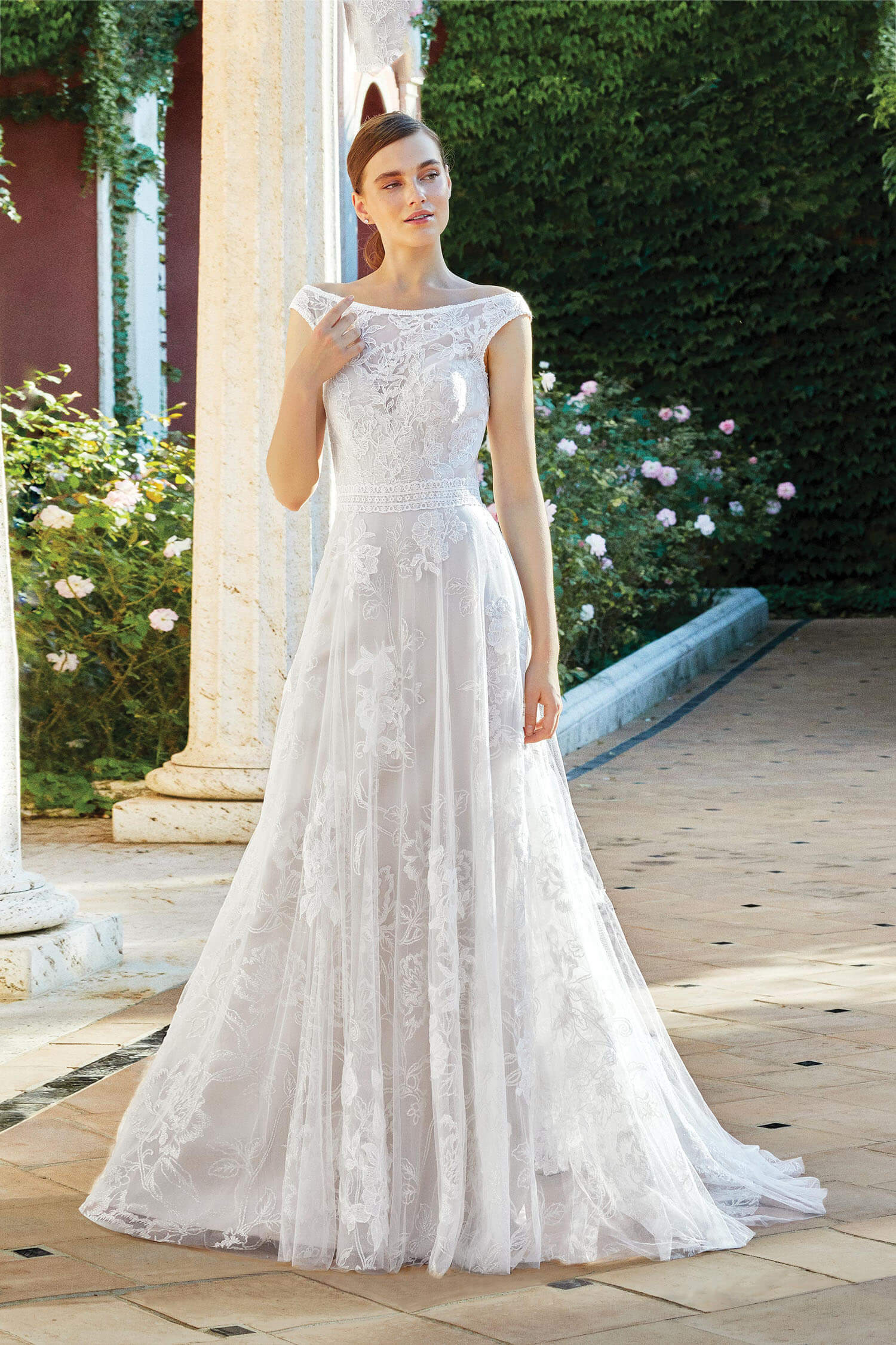 Bride wearing boat neck Aline gown with all over glitter lace and lace embroidered waistband.