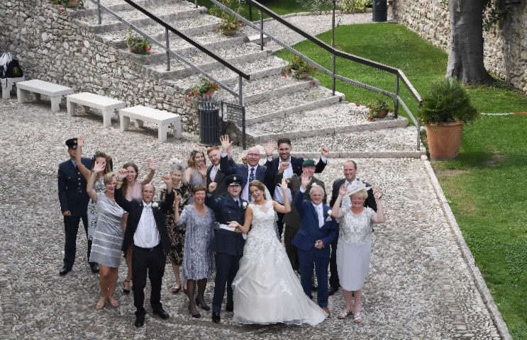 A bridal party in the grounds of