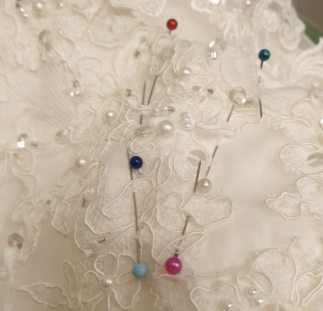 Bridal Gown with pins ready for alteration.