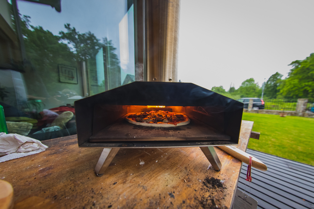 Interior view of a pellet fired home pizza oven in a garden