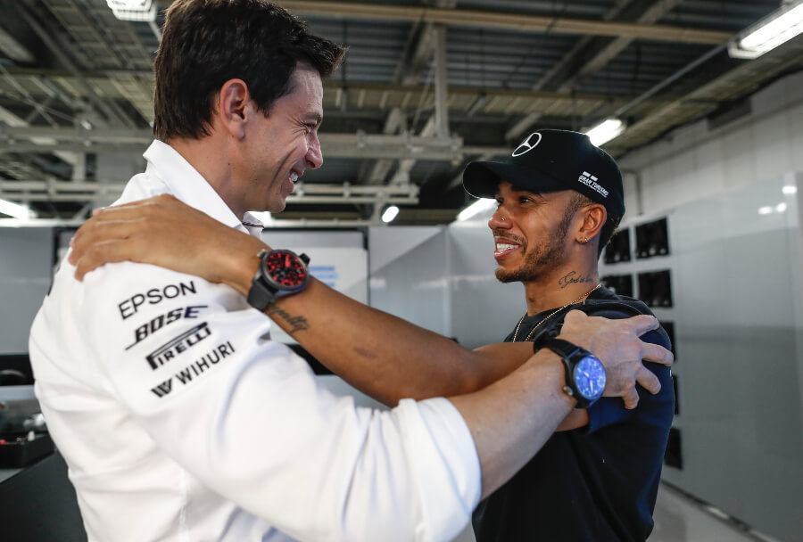 Lewis Hamilton wearing the Pilot's Watch TOP GUN Perpetual Calendar "Boutique Edition" (IW502903) with Toto Wolff
