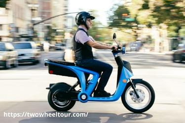 Man driving an electric scooter