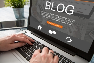 Woman writing a blog