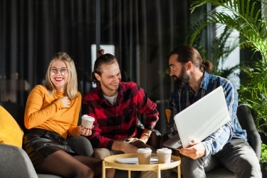 People interacting while having coffee