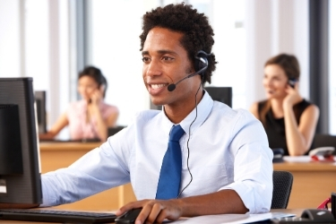 Professional man with headset working as a virtual assistant