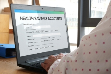 Person opening their Health Savings Accounts online