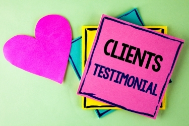 Sticky note with the words "Clients Testimonials"