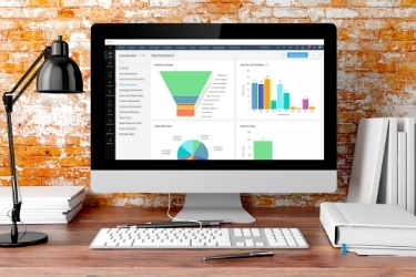 Zoho CRM dashboard on a computer