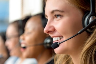 Woman with a headset doing customer service