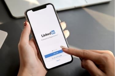 Phone with LinkedIn app open