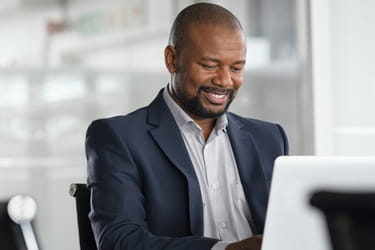Senior-level executive navigating through social media