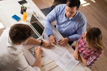 Couple working with a financial advisor