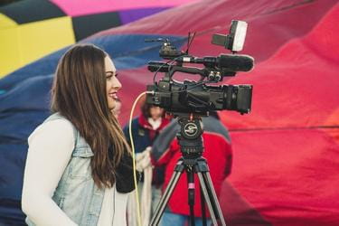 Woman with a videocamera