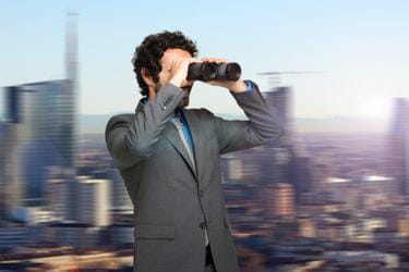 Business man with binoculars