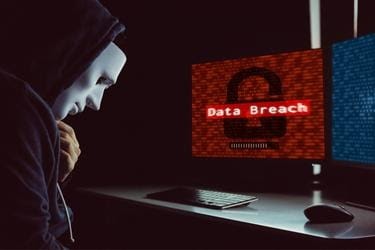 hacker causing a data breach