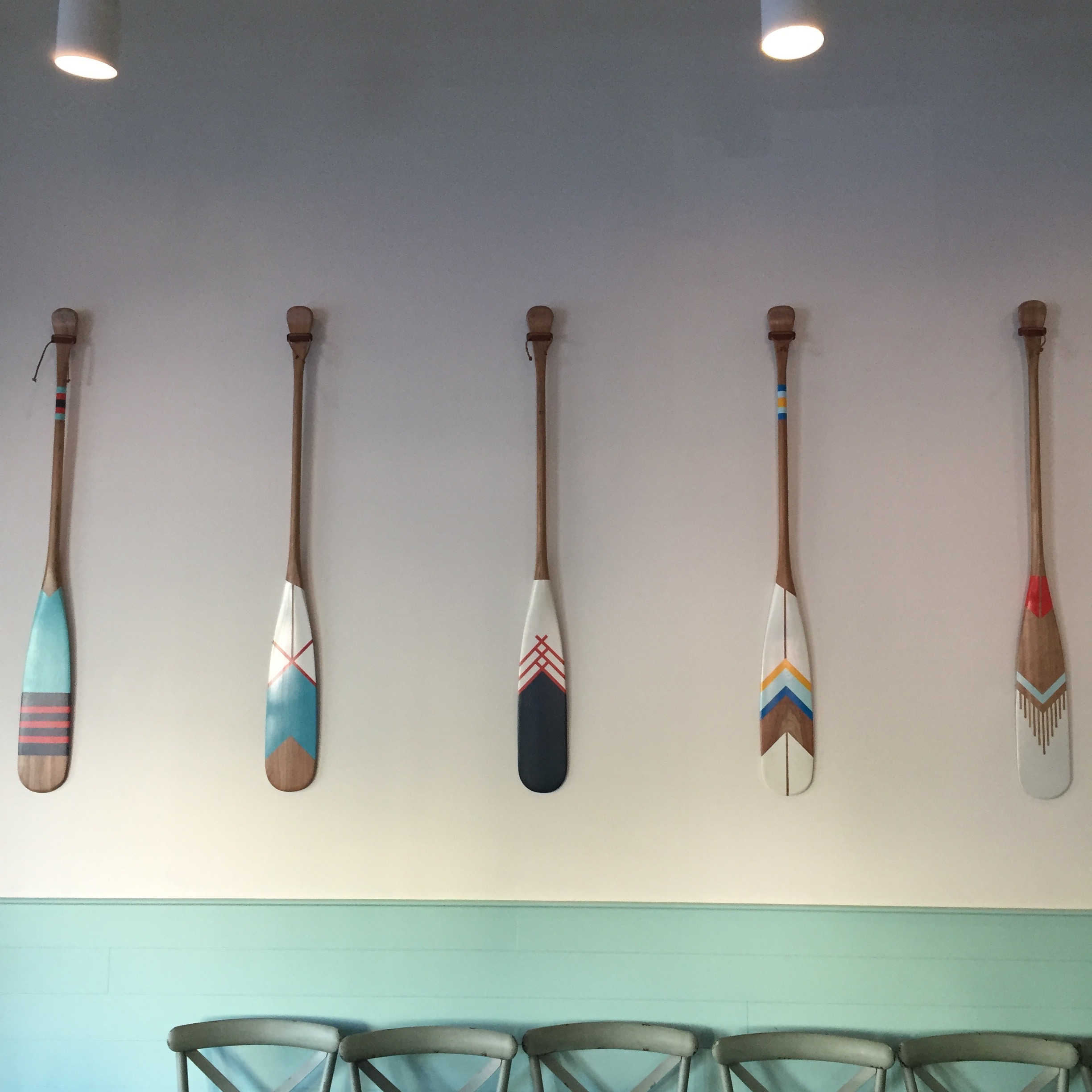 colorful boat oar wall decor