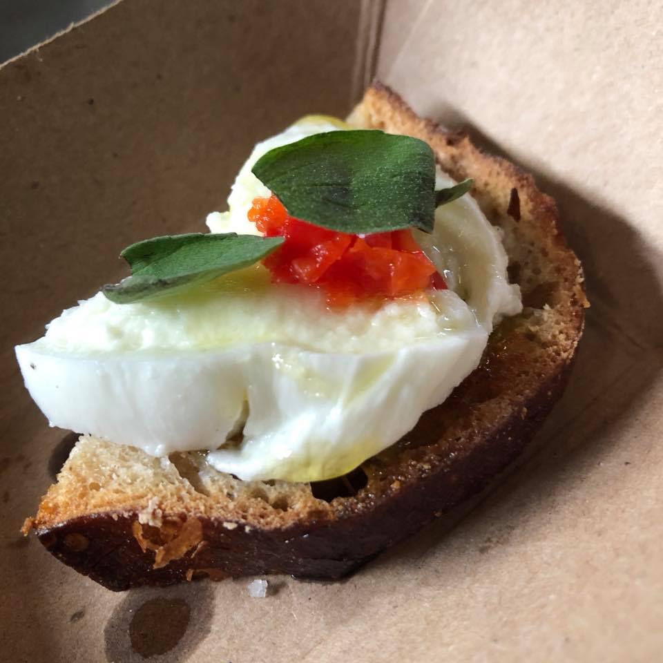 Buffalo Mozzarella Bruschetta with olive oil, thai chili and oregano from Pastaria