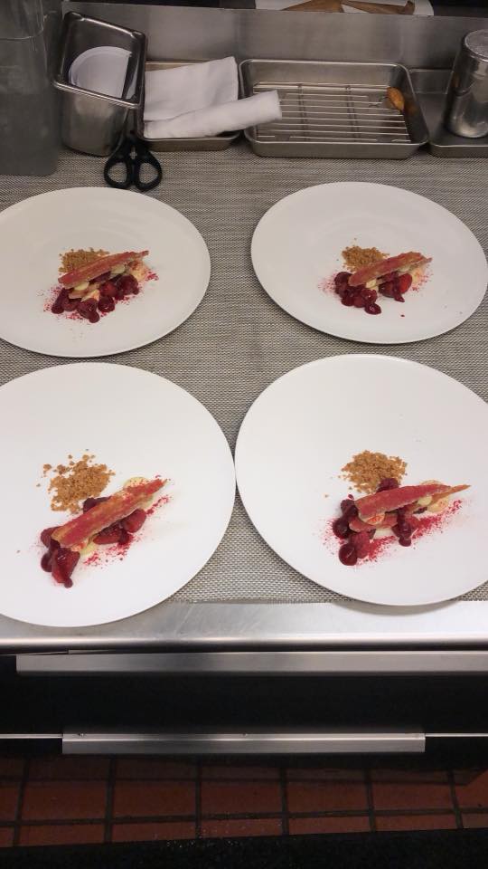 plating the dessert course in the kitchen at Canlis