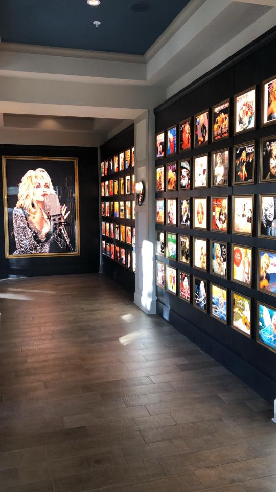 Dolly Parton's records and large portrait