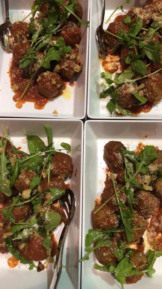 Plated meatball dish from Chef Tandy Wilson ready for serving