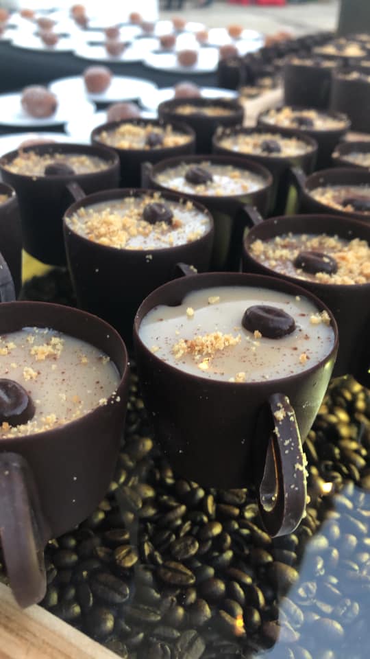 display of edible chocolate coffee cups
