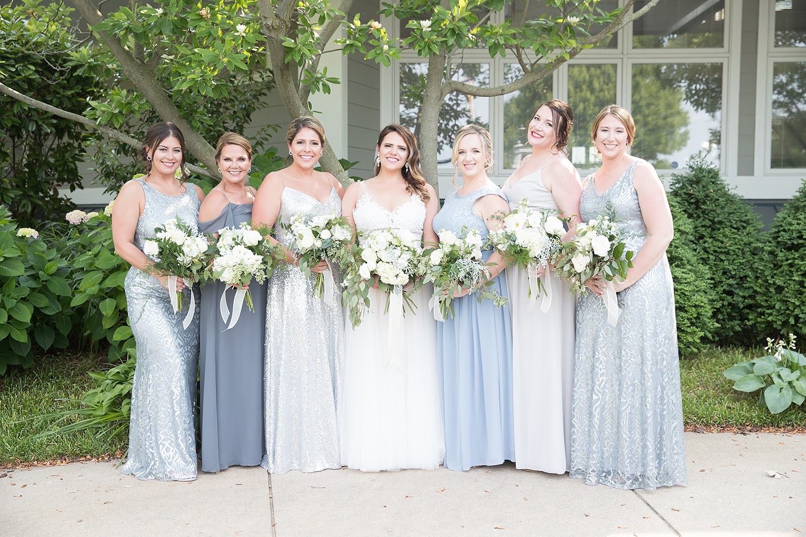 bridal party in light blue gowns