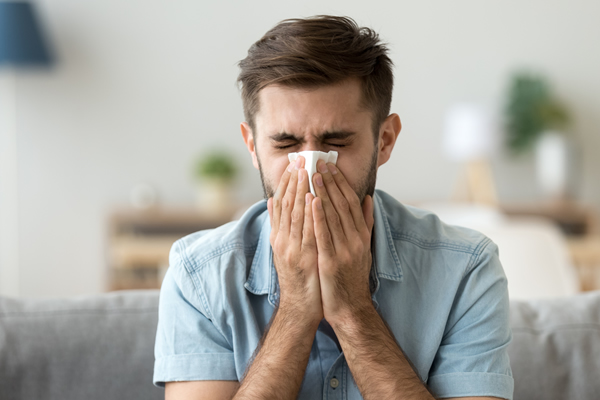 man suffering from sinus infection