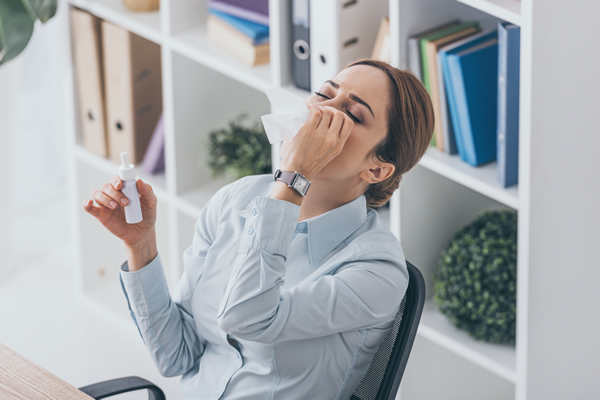 woman suffering from Chronic runny nose