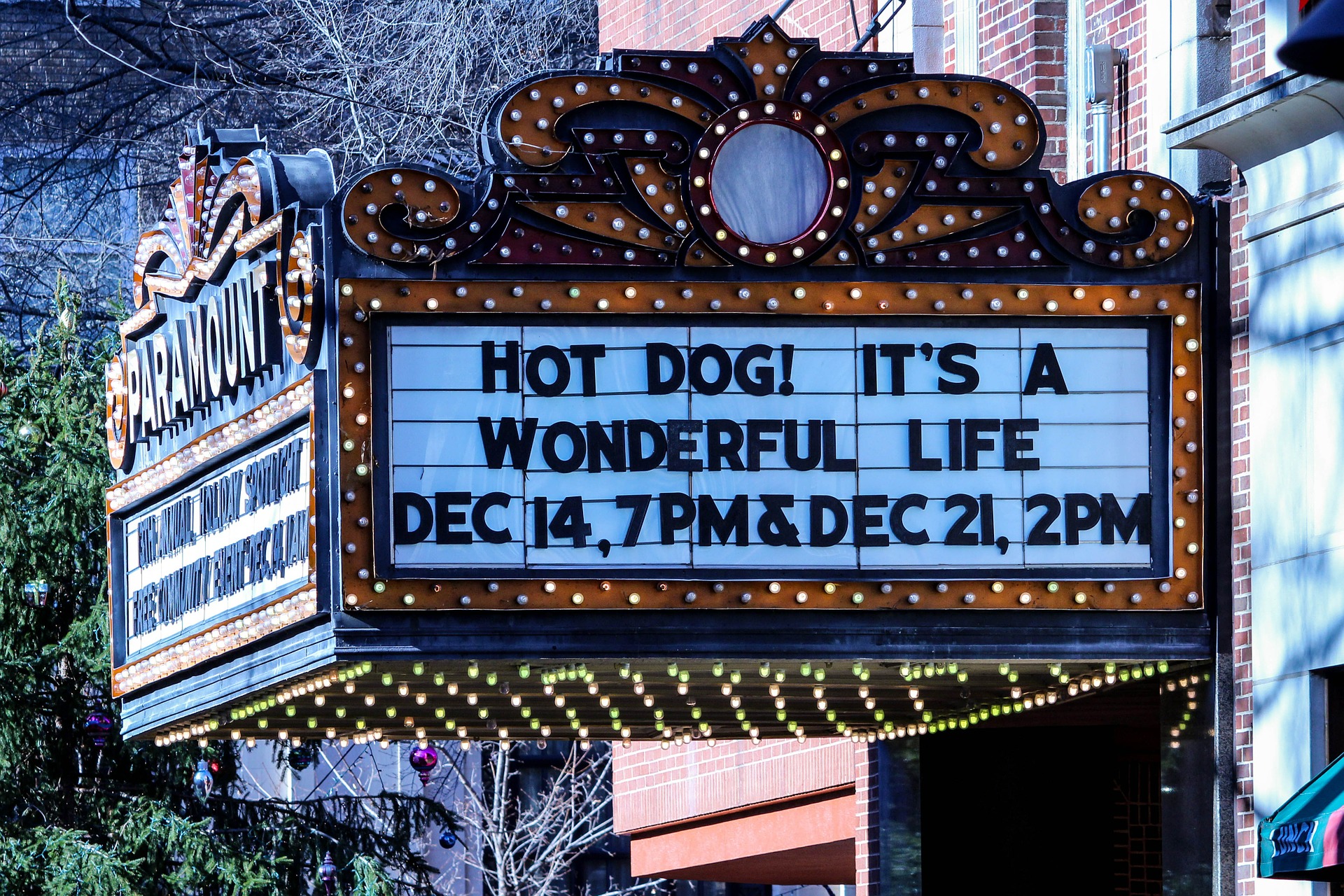 movie theater playing holiday classics, it's a wonderful life