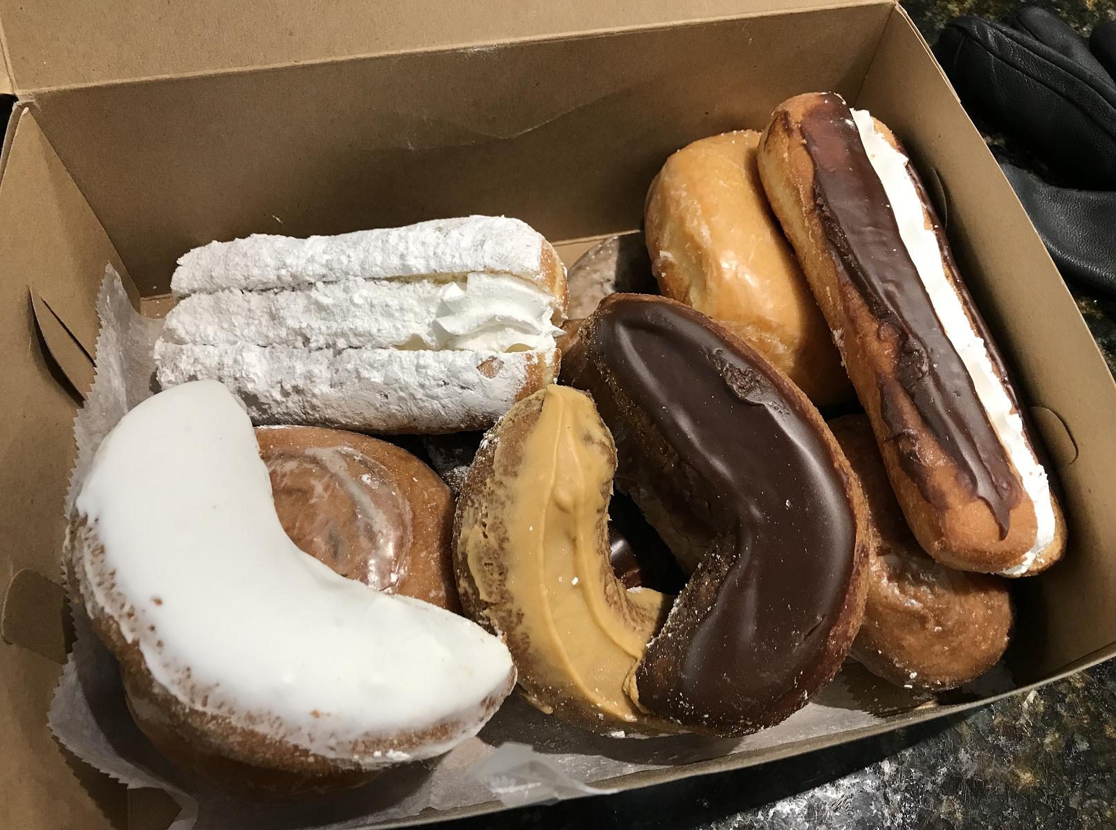 box of donuts and cream boats from Auddino's Italian Bakery