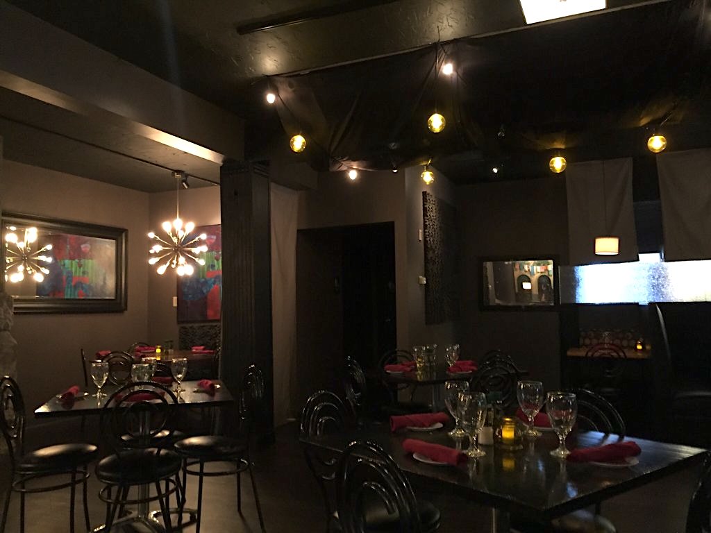 moodily lit interior of Moretti's of Arlington