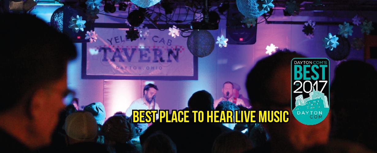 band playing inside Yellow Cab Tavern, with text that reads "BEST PLACE TO HEAR LIVE MUSIC"