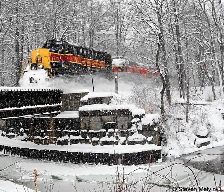 Cuyahoga Valley Train riding through snow at Railroad National Park
