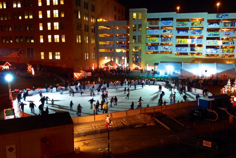 people skating outdoor in Lock 3 ice rink in the evening