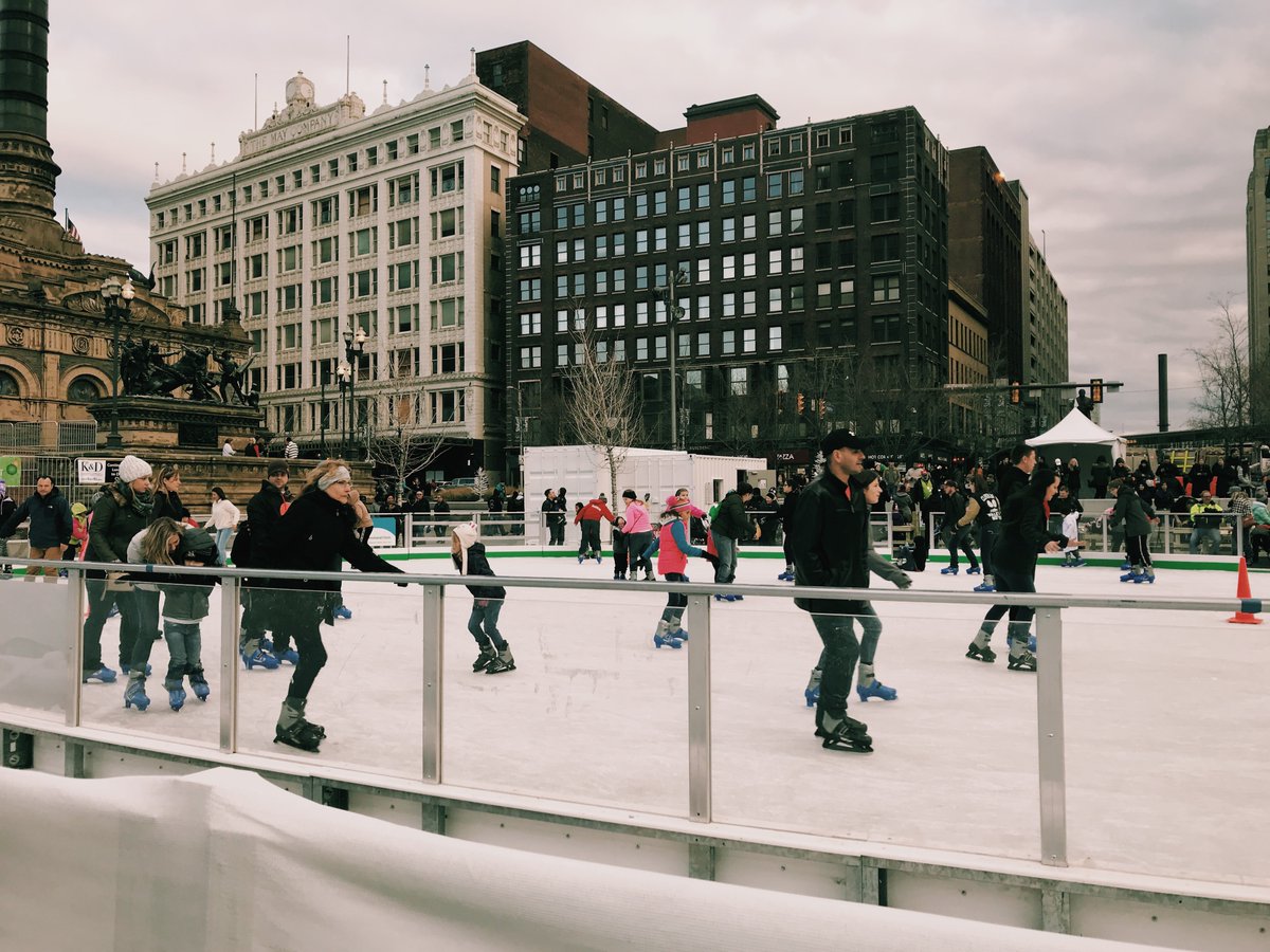 people ice skating on Cleveland Foundation Ice Rink in the public square