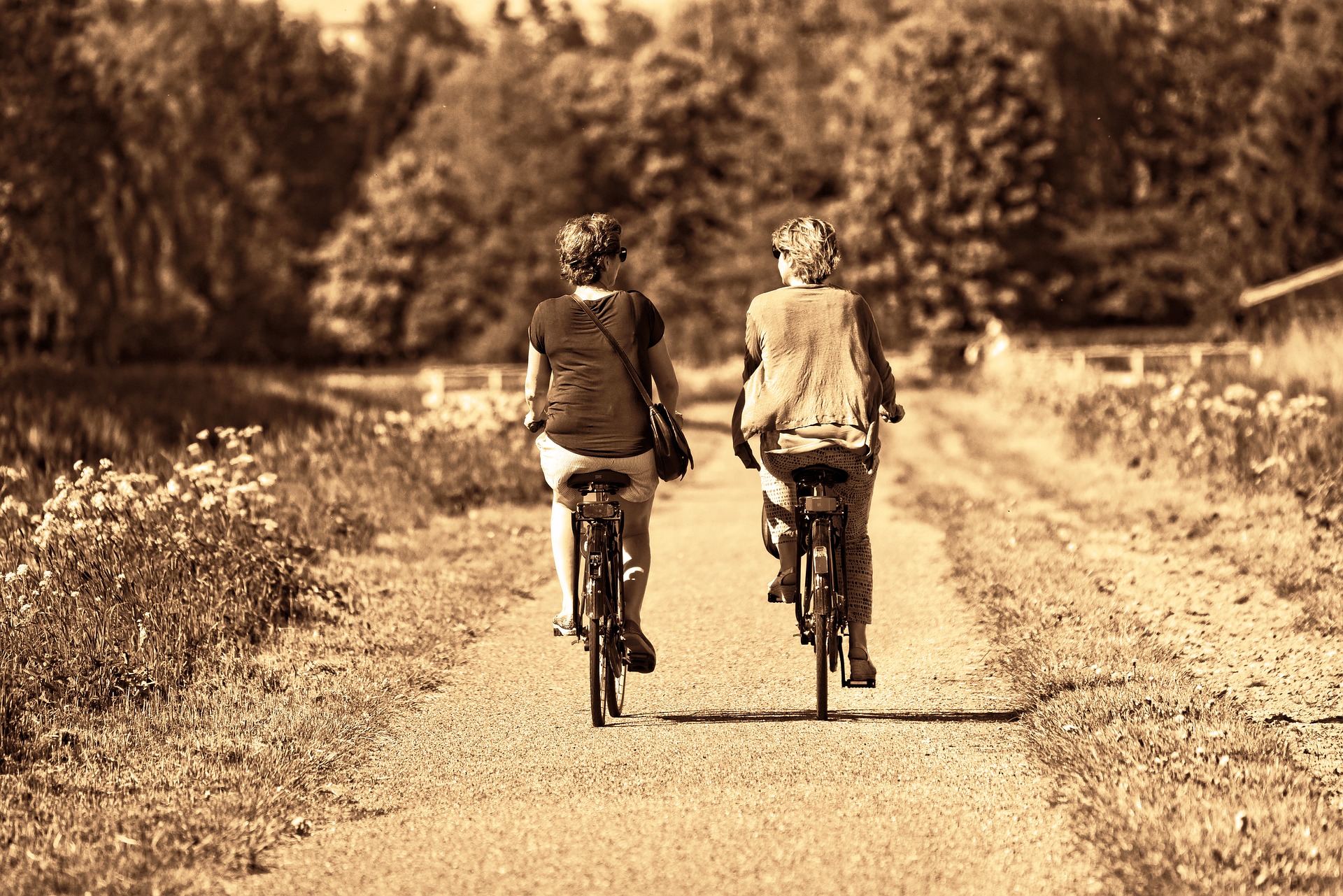 two women on bicycles