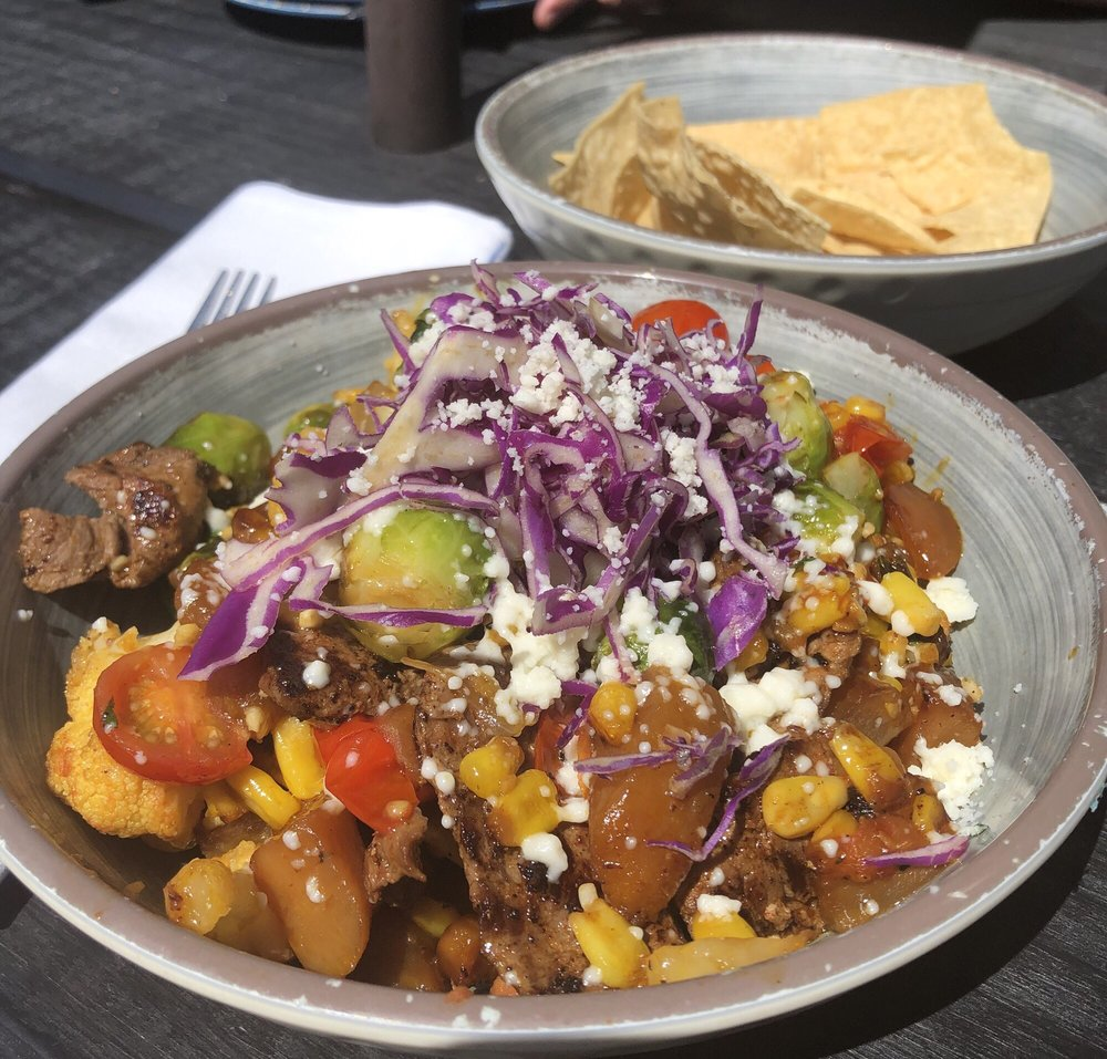 A colorful plate of Mexican food from 12 West