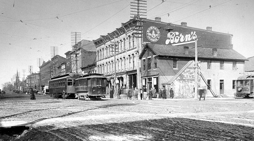 a historic image of the intersection between Sandusky and WIlliam Streets in Delaware, Ohio