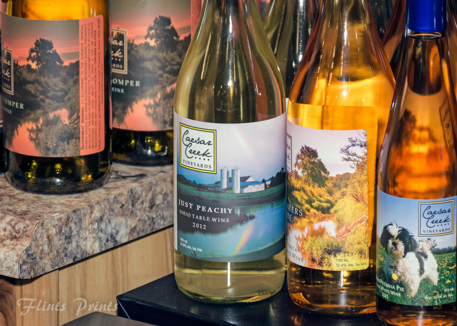 various wine bottles on countertop