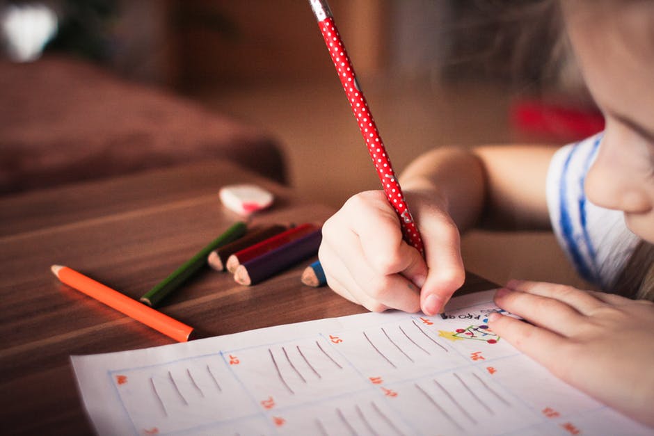 close-up of a young girl doing schoolwork