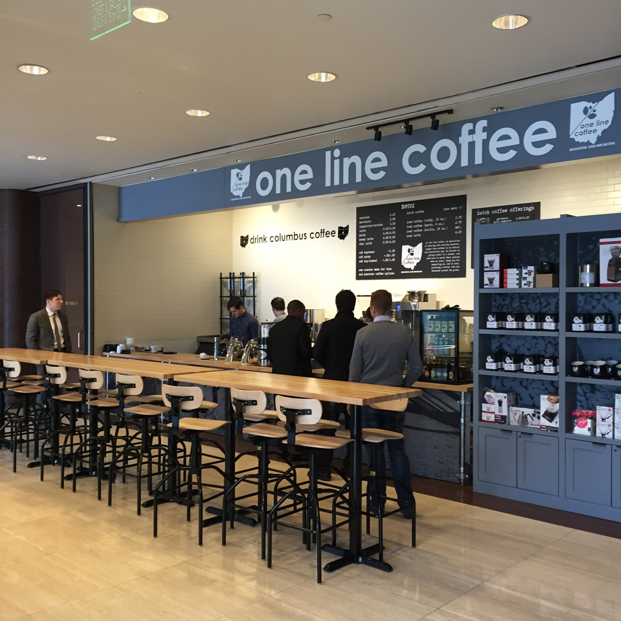 people waiting in line at one line coffee