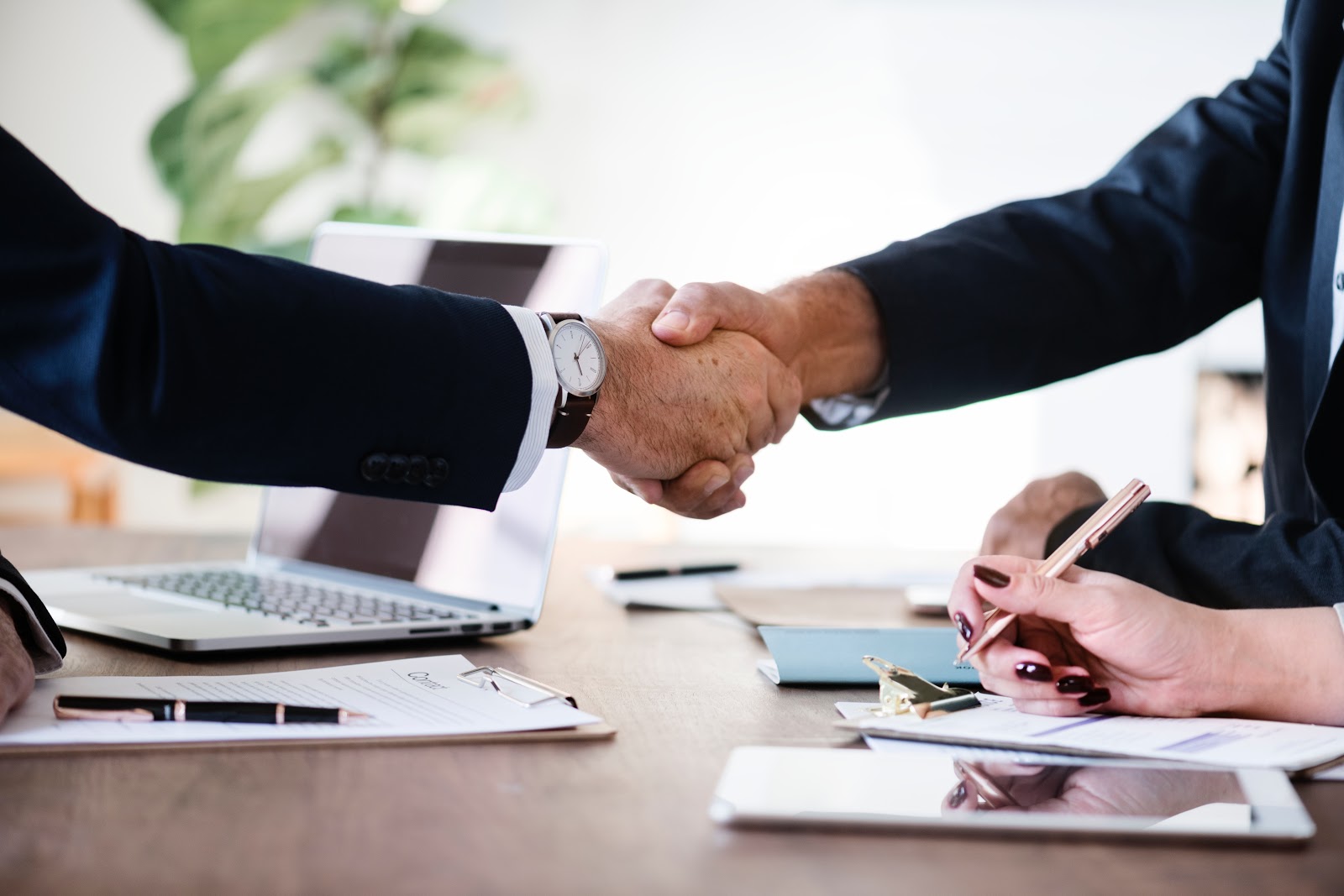 business men shaking hands