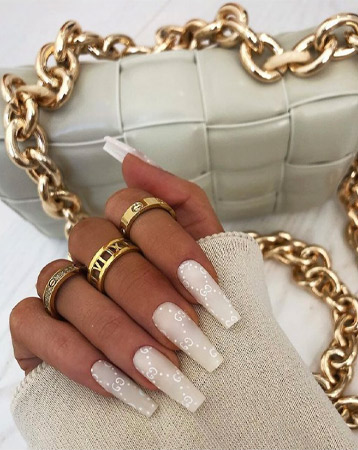 Designer logo nail manicure
