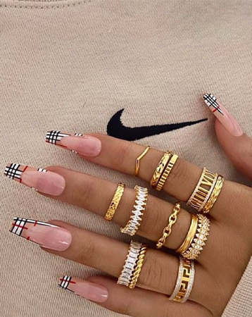 Designer logo nail manicure