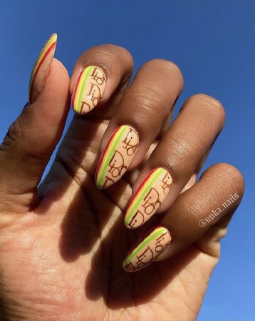 Designer logo nail manicure