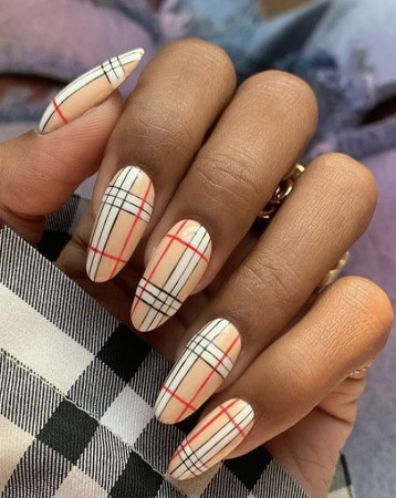 Designer logo nail manicure